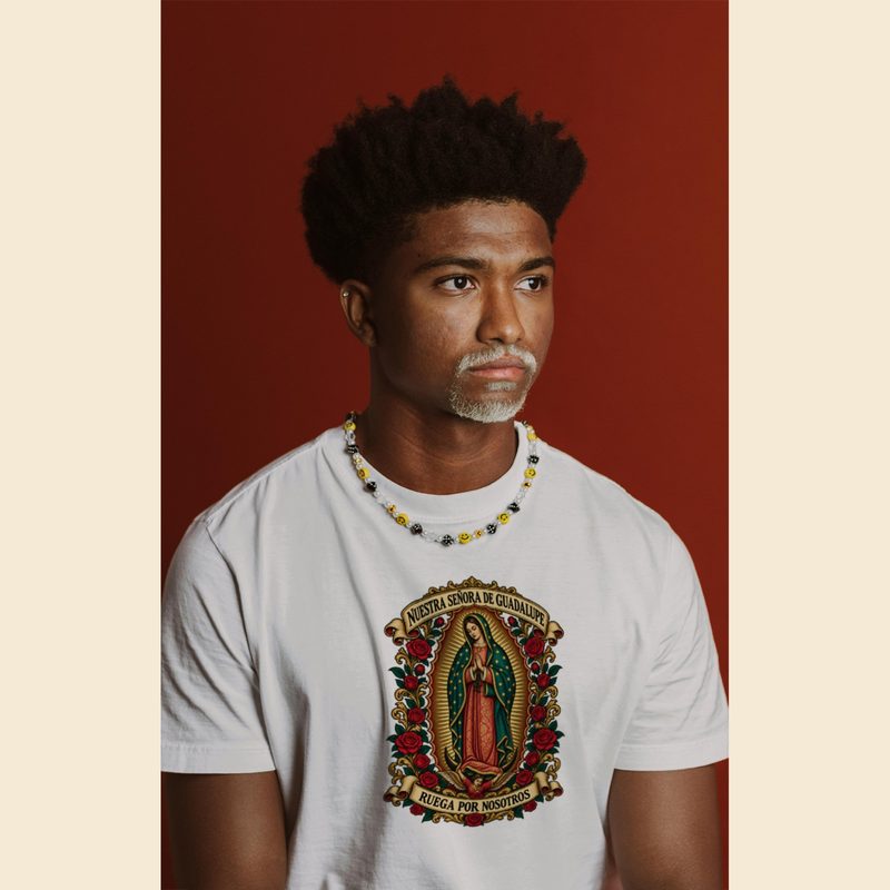 Model wearing the Our Lady of Guadalupe Shirt with nuestra Señora Ruega por Nosotros Tee